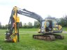 Powershift HD1 Super - The Bryce HD1 Super mounted on a 16 tonne Volvo swing shovel with a special tilt rotater head which allows the post driver to rotate through 180 degrees as well as tilt left and right. For the true professional that wants to offer a specialist service. Courtesy of Robbie Munro, Black Isle, Scotland.