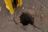Rock Spike - 150mm diameter hole punched 1.2 metres deep in hard compacted shale/quarry rock.
