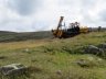  - Myself working at 800mts altitude in the Cheviot Hills in Southern Scotland erecting a new fence on the Scotland/England. Scotland on the right and England on the left. Very hard conditions at this end of the fence and peat bog at the far end in the distance.