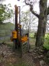HD180 - Swing the mast round to drive in the slam post.