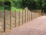 HD180 - Bryce Groundworks do a lot of equestrian arenas where we are often engaged to do the complete contract which obviously includes the fencing. This is the standard that we work to, carried out by my son, Stuart. These posts were 2.1x 150x 75 (7' x 6" x 3"). Conditions were hard.
